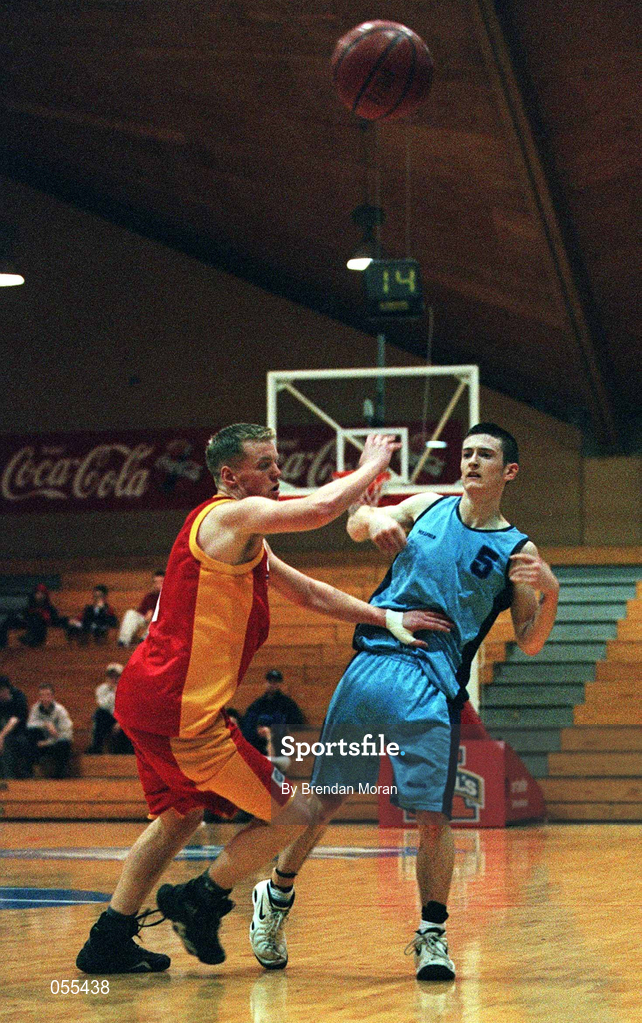 28 January 2001; William O'Regan of Neptune in action against Gareth Mongey of Big Al's Notre Dame during the Men's U19 Cup Final match between Neptune and Big Al's Notre Dame at the National Basketball Arena in Tallaght, Dublin. Photo by Brendan Moran/Sportsfile