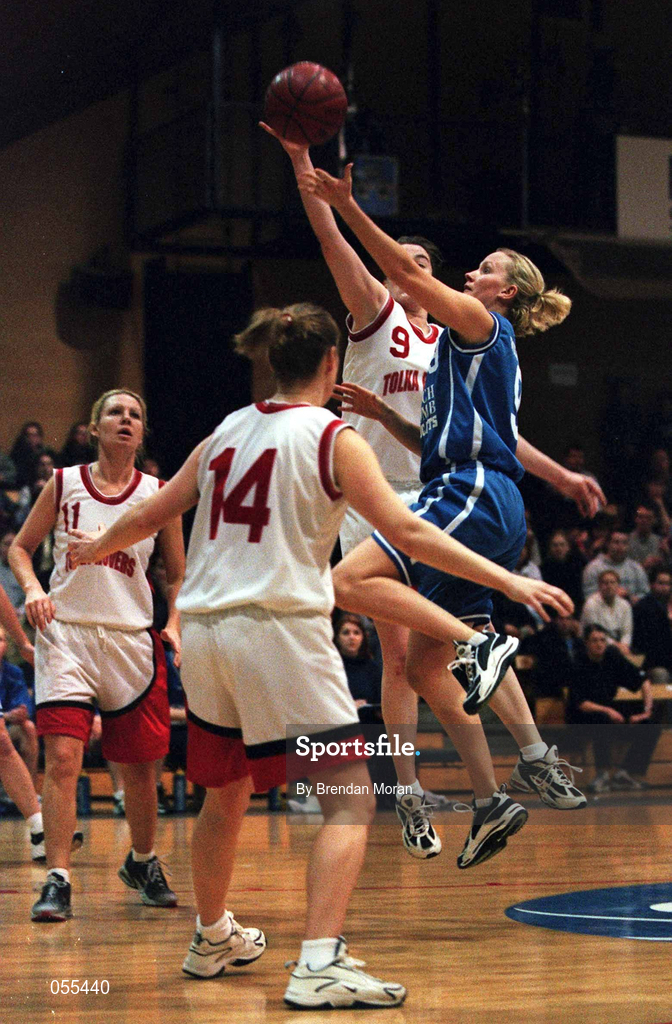 28 January 2001; Wildcats' Catriona White shoots for two as Suzanne Maguire of Tolka Rovers comes to block during the ESB Women's Cup Final match between Wildcats and Tolka Rovers at the National Basketball Arena in Tallaght, Dublin. Photo by Brendan Moran/Sportsfile