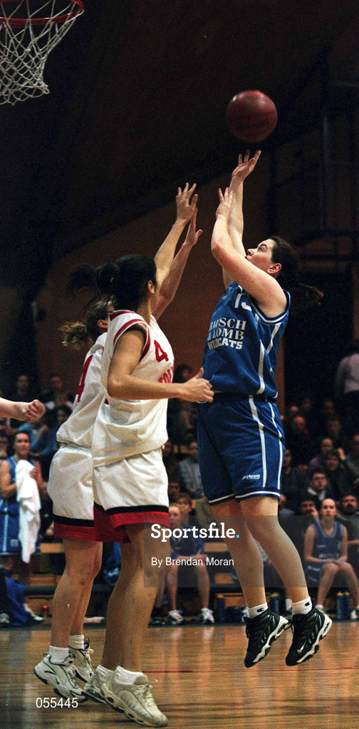 28 January 2001; Trish Nolan of Wildcats shoots for two as Vanessa Burke and Rachel Kelly of Tolka Rovers come to block during the ESB Women's Cup Final match between Wildcats and Tolka Rovers at the National Basketball Arena in Tallaght, Dublin. Photo by Brendan Moran/Sportsfile