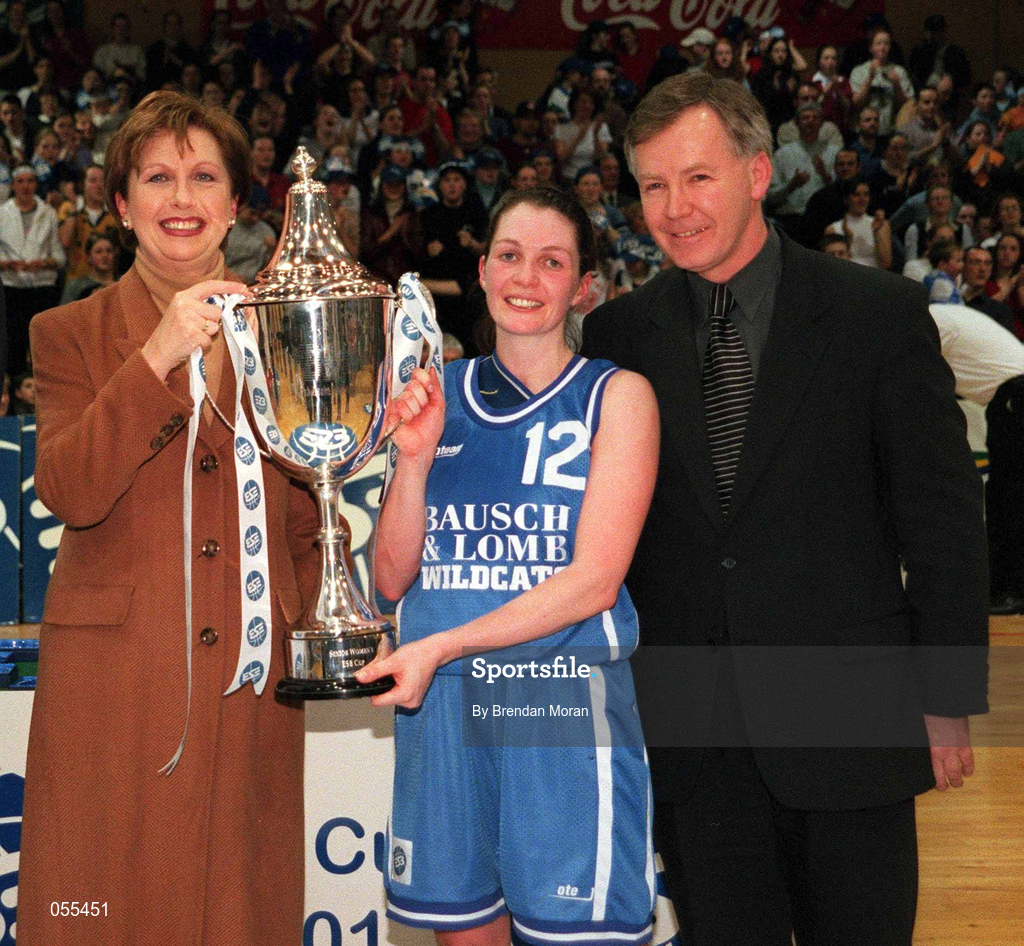28 January 2001; President Mary McAleese, presents the ESB Women's Cup to Wildcats captain Christine Kiely in the presence of Finn Ahern, President, Irish Basketball Association following the ESB Women's Cup Final match between Wildcats and Tolka Rovers at the National Basketball Arena in Tallaght, Dublin. Photo by Brendan Moran/Sportsfile