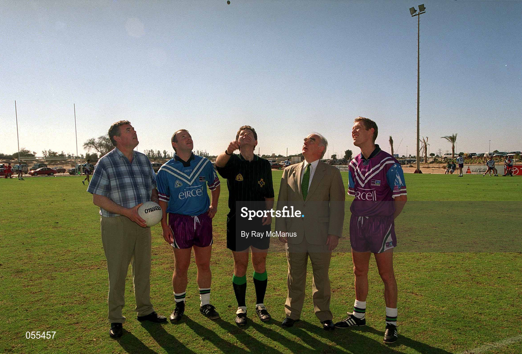 26 January 2001; Referee, Brian White tosses the coin, also pictured are 1999 All Stars, Declan O'Keeffe and Graham Geraghty, GAA President, Sean McCague and Conor Murphy Irish Ambassador to the region during an exhibition match on the Eircell GAA All-Star tour at the Dubai Rugby Ground in Dubai, United Arab Emirates. Photo by Ray McManus/Sportsfile