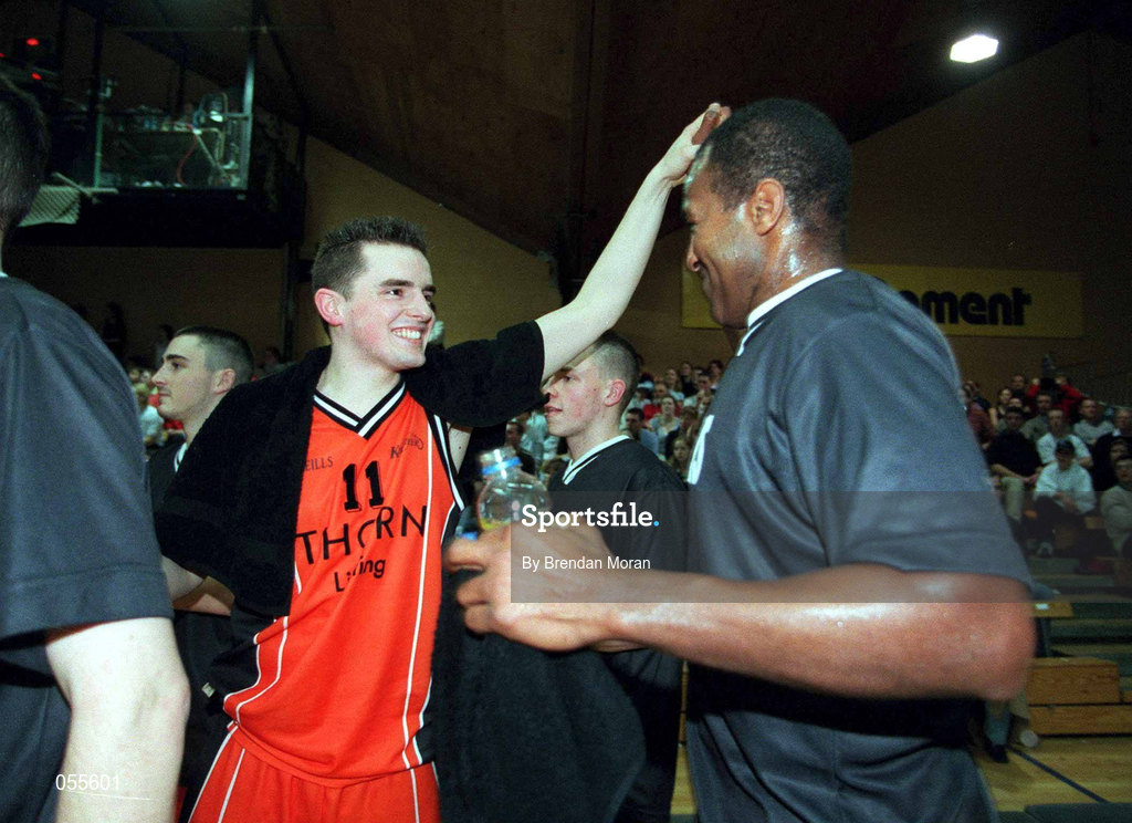 28 January 2001; Paddy Kelly, left, celebrates with Killester team-mate Ed Randolph following the ESB Men's Cup Final match between Killester and Longnecks Ballina at the National Basketball Arena in Tallaght, Dublin. Photo by Brendan Moran/Sportsfile