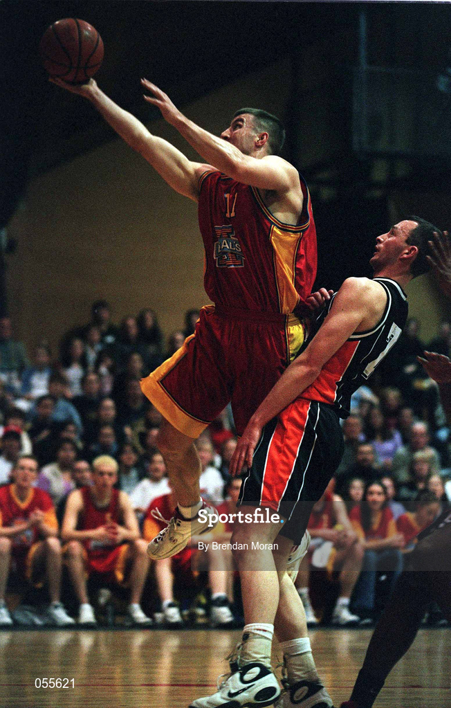 27 January 2001; Brandon Hughes of Big Al's Notre Dame in action against Damien Sealy of Killester during the ESB Men's Cup Semi-Final match between Killester and Big Al's Notre Dame at the National Basketball Arena in Tallaght, Dublin. Photo by Brendan Moran/Sportsfile