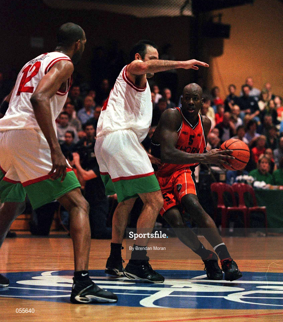 28 January 2001; Eric Jackson of Killester in action against Liam McHale, centre, and Damon Rowntree of Longnecks Ballina during the ESB Men's Cup Final match between Killester and Longnecks Ballina at the National Basketball Arena in Tallaght, Dublin. Photo by Brendan Moran/Sportsfile