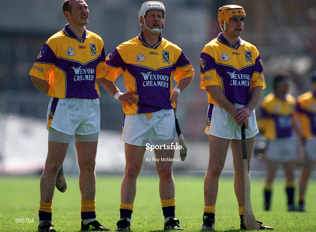 18 June 2000; Wexford hurlers, from left, Larry Murphy, Tom Dempsey and Chris McGrath stand for the National Anthem ahead of the Guinness Leinster Senior Hurling Championship semi-final match between Offaly and Wexford at Croke Park in Dublin. Photo by Ray McManus/Sportsfile