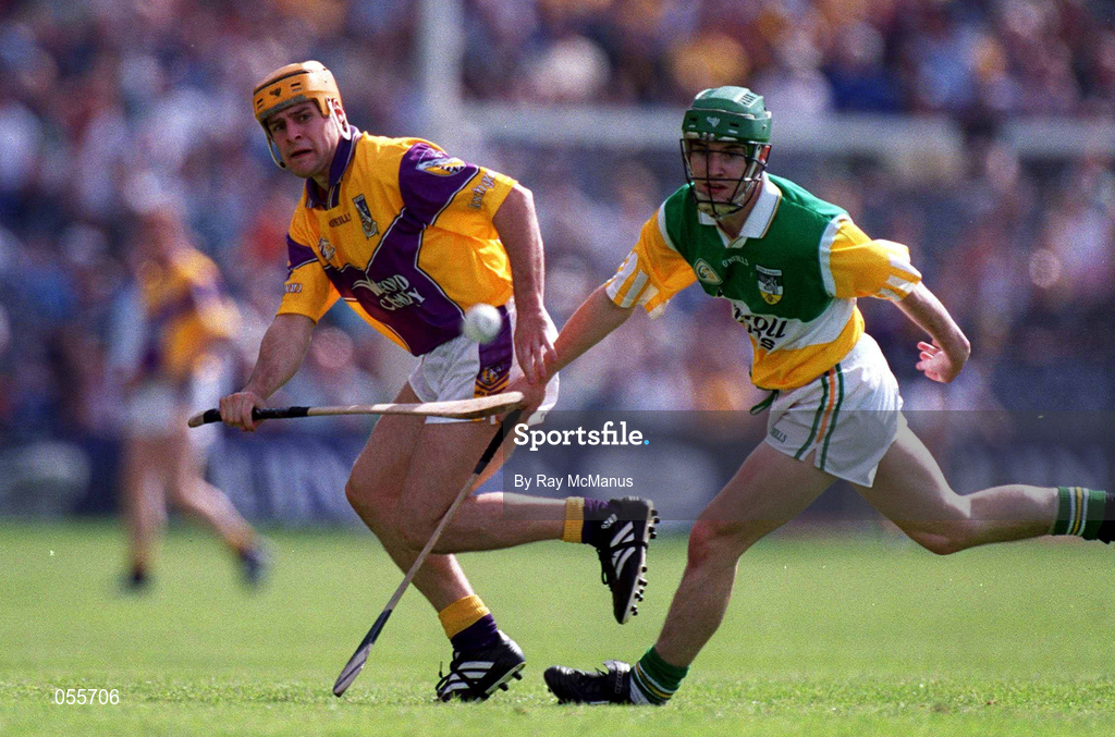 18 June 2000; Michael Jordan of Wexford in action against David Frants of Offaly during the Guinness Leinster Senior Hurling Championship semi-final match between Offaly and Wexford at Croke Park in Dublin. Photo by Ray McManus/Sportsfile