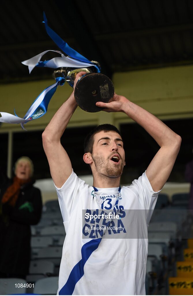 28 November 2015; St Mary's captain Sean Cournane lifts the cup following his side's victory. AIB Munster GAA Football Intermediate Club Championship Final, St Mary's, Kerry, v Carrigaline, Cork. Fitzgerald Stadium, Killarney, Co. Kerry. Picture credit: Stephen McCarthy / SPORTSFILE
