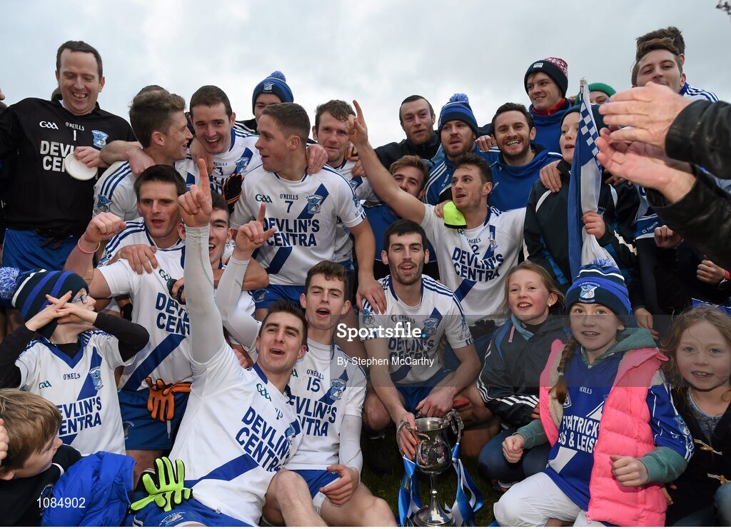 28 November 2015; St Mary's players and supporters celebrate following their victory. AIB Munster GAA Football Intermediate Club Championship Final, St Mary's, Kerry, v Carrigaline, Cork. Fitzgerald Stadium, Killarney, Co. Kerry. Picture credit: Stephen McCarthy / SPORTSFILE
