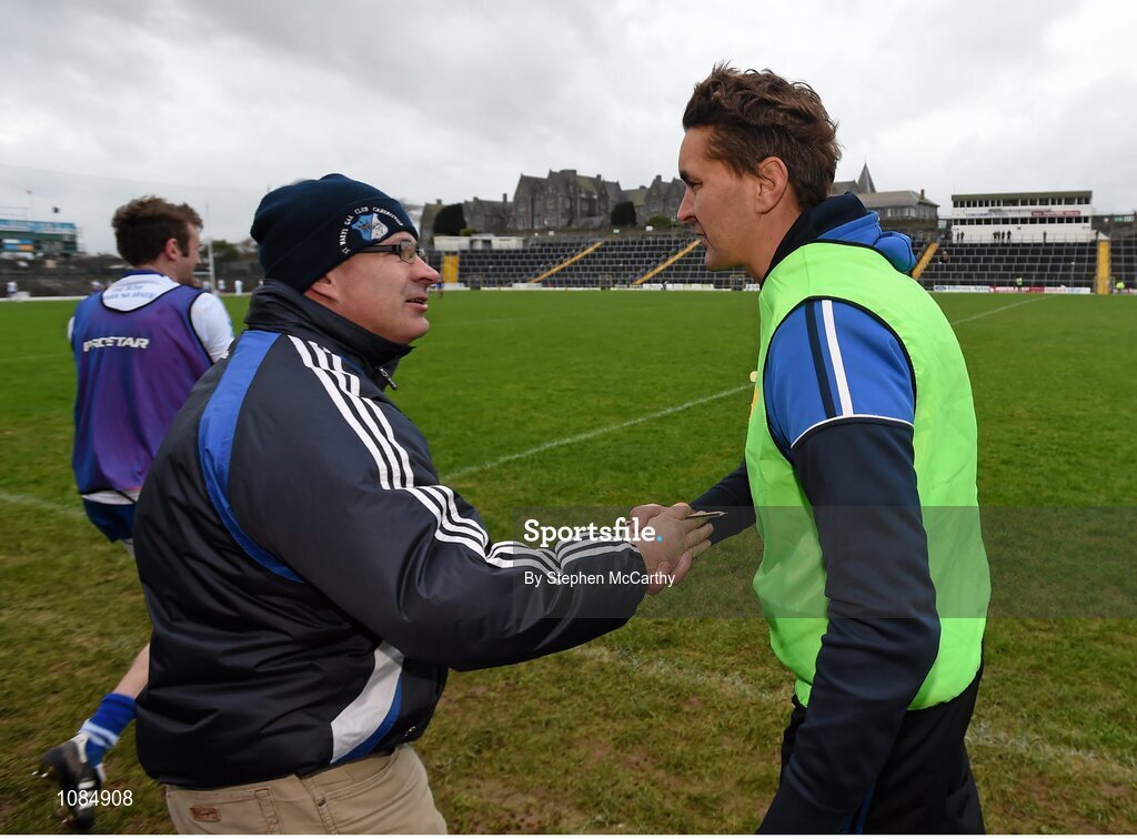 28 November 2015; St Mary's manager Maurice Fitzgerald is congratulated by club chairman Mossey Coffey following his side's victory. AIB Munster GAA Football Intermediate Club Championship Final, St Mary's, Kerry, v Carrigaline, Cork. Fitzgerald Stadium, Killarney, Co. Kerry. Picture credit: Stephen McCarthy / SPORTSFILE