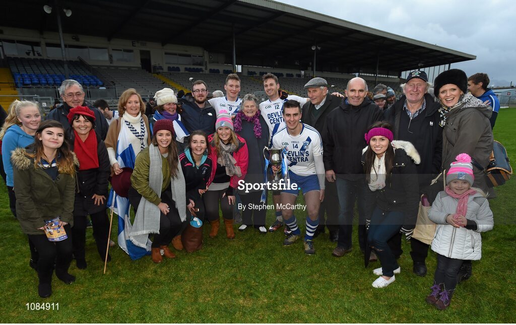 28 November 2015; St Mary's players Denis Daly, Paul O'Donoghue and Daniel Daly, with family following their victory. AIB Munster GAA Football Intermediate Club Championship Final, St Mary's, Kerry, v Carrigaline, Cork. Fitzgerald Stadium, Killarney, Co. Kerry. Picture credit: Stephen McCarthy / SPORTSFILE