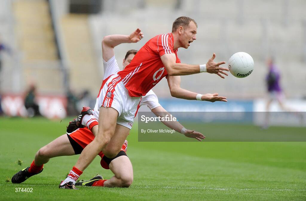 23 August 2009; Alan O'Connor, Cork, in action against Enda McGinley, Tyrone. GAA Football All-Ireland Senior Championship Semi-Final, Tyrone v Cork, Croke Park, Dublin. Picture credit: Oliver McVeigh / SPORTSFILE