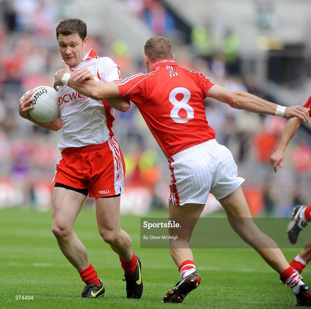 23 August 2009; Enda McGinley, Tyrone, in action against Alan O'Connor, Cork. GAA Football All-Ireland Senior Championship Semi-Final, Tyrone v Cork, Croke Park, Dublin. Picture credit: Oliver McVeigh / SPORTSFILE