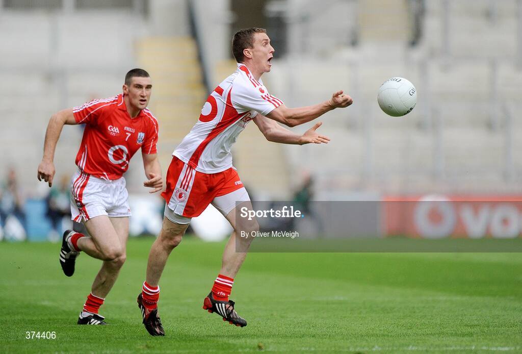 23 August 2009; Tommy McGuigan, Tyrone, in action against Noel O'Leary, Cork. GAA Football All-Ireland Senior Championship Semi-Final, Tyrone v Cork, Croke Park, Dublin. Picture credit: Oliver McVeigh / SPORTSFILE
