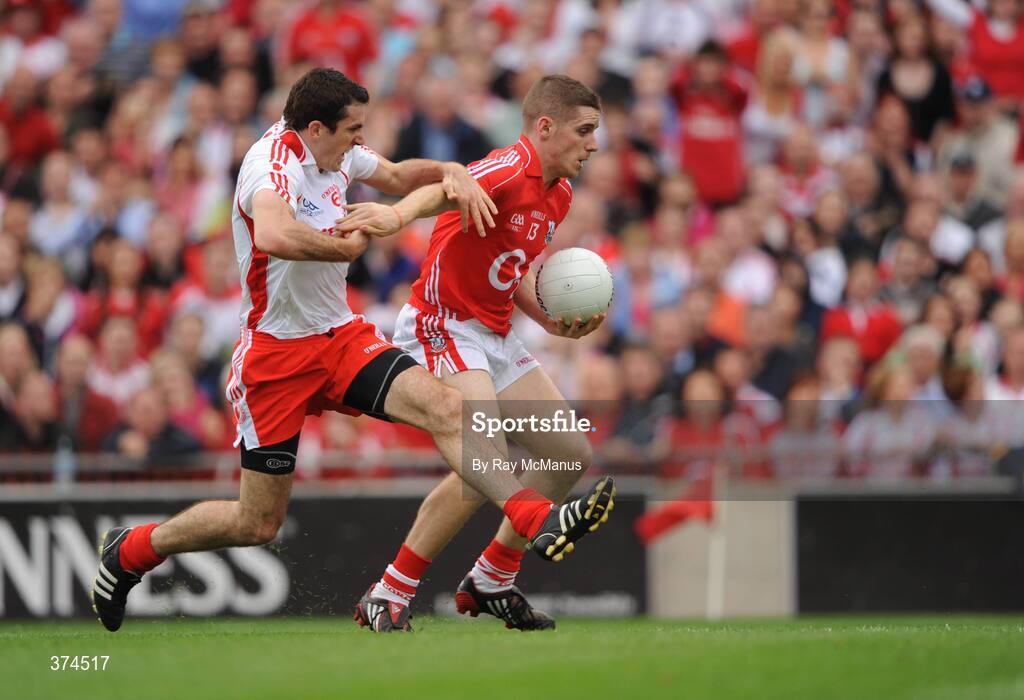23 August 2009; Daniel Goulding, Cork, in action against Justin McMahon, Tyrone. GAA Football All-Ireland Senior Championship Semi-Final, Tyrone v Cork, Croke Park, Dublin. Picture credit: Ray McManus / SPORTSFILE