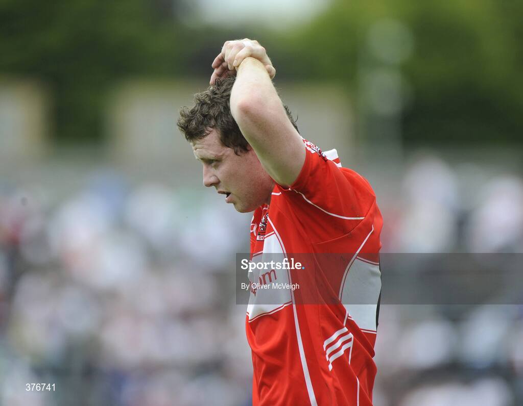 21 June 2009; A dejected Barry McGoldrick, Derry, after the final whistle. GAA Football Ulster Senior Championship Semi-Final, Tyrone v Derry, Casement Park, Belfast, Co. Antrim. Picture credit: Oliver McVeigh / SPORTSFILE