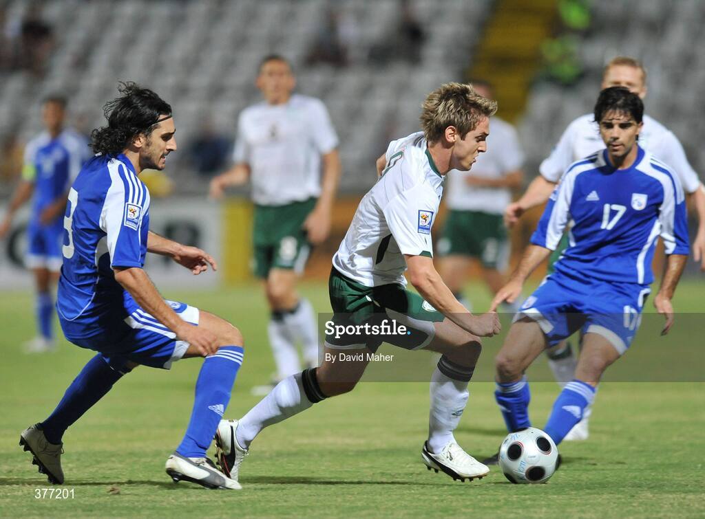 5 September 2009; Goal scorer Kevin Doyle, Republic of Ireland, in action against Elias Charalambous, left and Marinos Satsias, Cyprus. Cyprus v Republic of Ireland - 2010 FIFA World Cup Qualifier, GSP Stadium, Nicosia, Cyprus. Picture credit: David Maher / SPORTSFILE