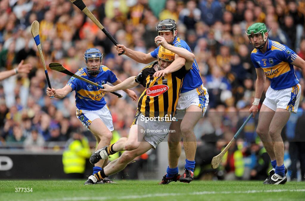 6 September 2009; Richie Power, Kilkenny, is tackled by Paul Curran, Tipperary, which led to a penalty for Kilkenny. GAA Hurling All-Ireland Senior Championship Final, Kilkenny v Tipperary, Croke Park, Dublin. Picture credit: Brendan Moran / SPORTSFILE