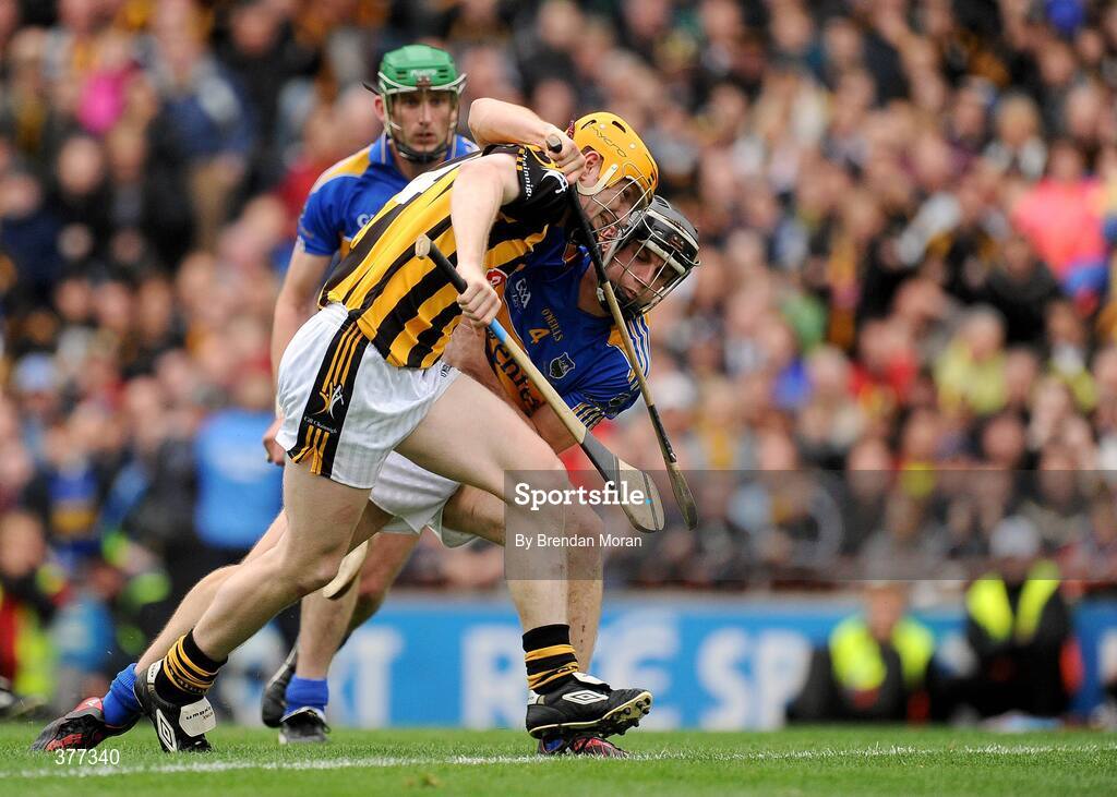 6 September 2009; Richie Power, Kilkenny, is tackled by Paul Curran, Tipperary, which led to a penalty for Kilkenny. GAA Hurling All-Ireland Senior Championship Final, Kilkenny v Tipperary, Croke Park, Dublin. Picture credit: Brendan Moran / SPORTSFILE