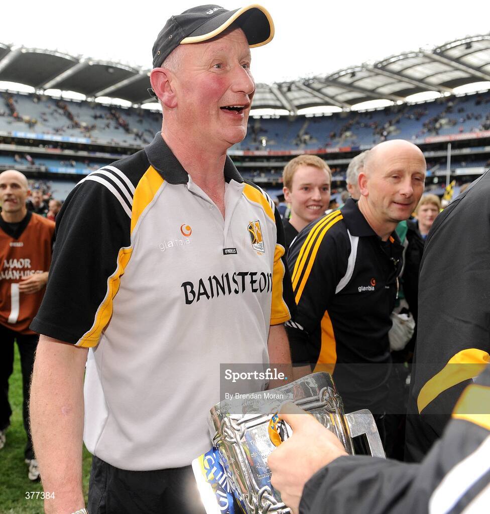 6 September 2009; A Kilkenny substitute attempts to hand the Liam MacCarthy cup to manager Brian Cody pitch side after the game. GAA Hurling All-Ireland Senior Championship Final, Kilkenny v Tipperary, Croke Park, Dublin. Picture credit: Brendan Moran / SPORTSFILE
