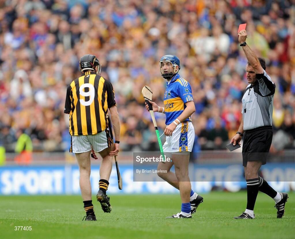 6 September 2009; Tipperary's Benny Dunne leaves the field as he is shown the red card by referee Diarmuid Kirwan. GAA Hurling All-Ireland Senior Championship Final, Kilkenny v Tipperary, Croke Park, Dublin. Picture credit: Brian Lawless / SPORTSFILE