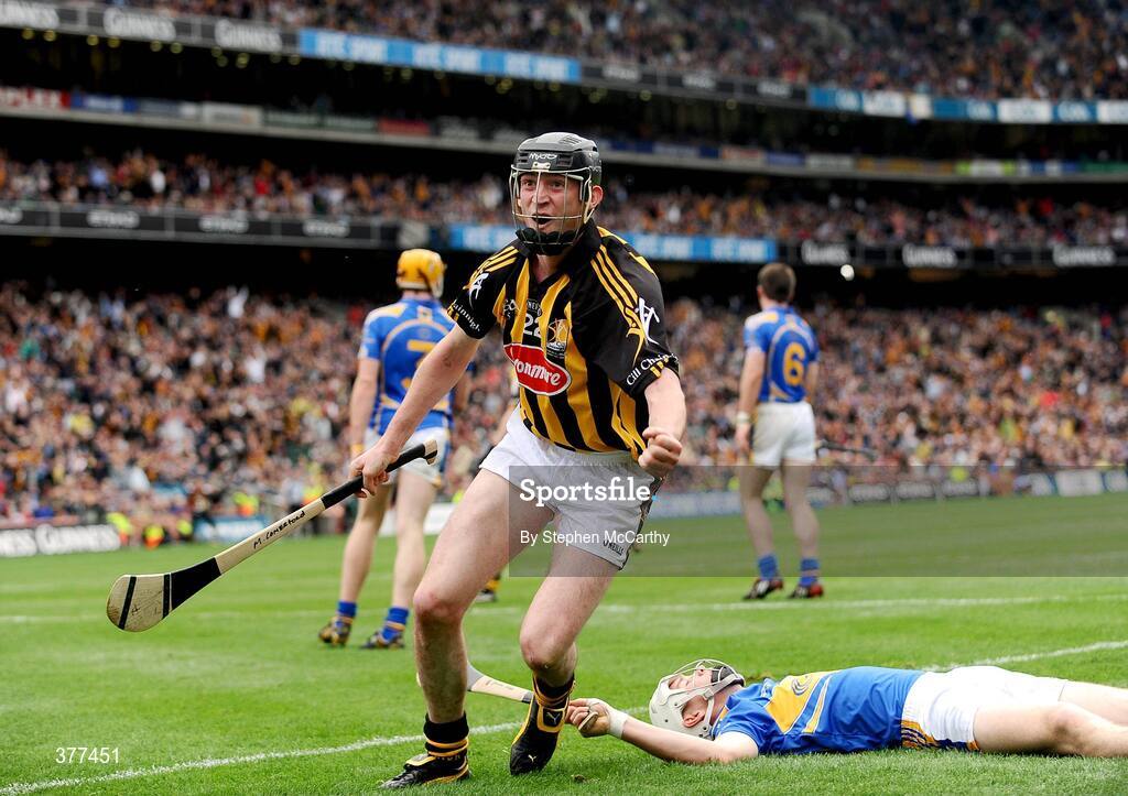 6 September 2009; Martin Comerford, Kilkenny, celebrates scoring his side's second goal despite the attention of Brendan Maher, Tipperary. GAA Hurling All-Ireland Senior Championship Final, Kilkenny v Tipperary, Croke Park, Dublin. Picture credit: Stephen McCarthy / SPORTSFILE
