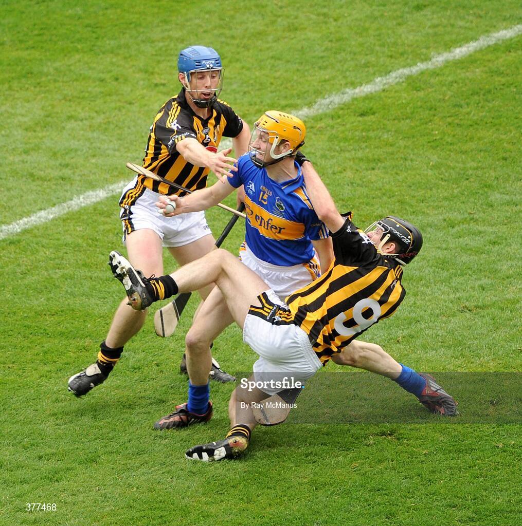 6 September 2009; Brian Hogan and Michael Rice, 9,  Kilkenny, combine to thwart Tipperary's Lar Corbett. GAA Hurling All-Ireland Senior Championship Final, Kilkenny v Tipperary, Croke Park, Dublin. Picture credit: Ray McManus / SPORTSFILE