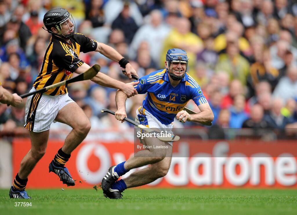 6 September 2009; Eoin Kelly, Tipperary, in action against J.J. Delaney, Kilkenny. GAA Hurling All-Ireland Senior Championship Final, Kilkenny v Tipperary, Croke Park, Dublin. Picture credit: Brian Lawless / SPORTSFILE