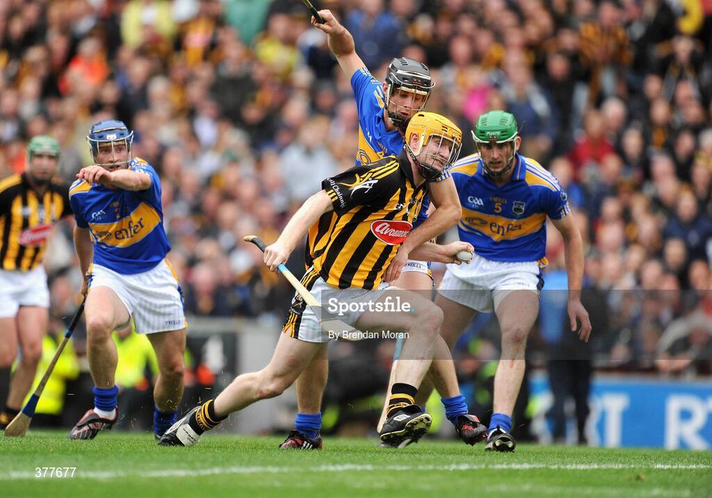 6 September 2009; Richie Power, Kilkenny, is tackled by Paul Curran, Tipperary, which led to a penalty for Kilkenny. GAA Hurling All-Ireland Senior Championship Final, Kilkenny v Tipperary, Croke Park, Dublin. Picture credit: Brendan Moran / SPORTSFILE