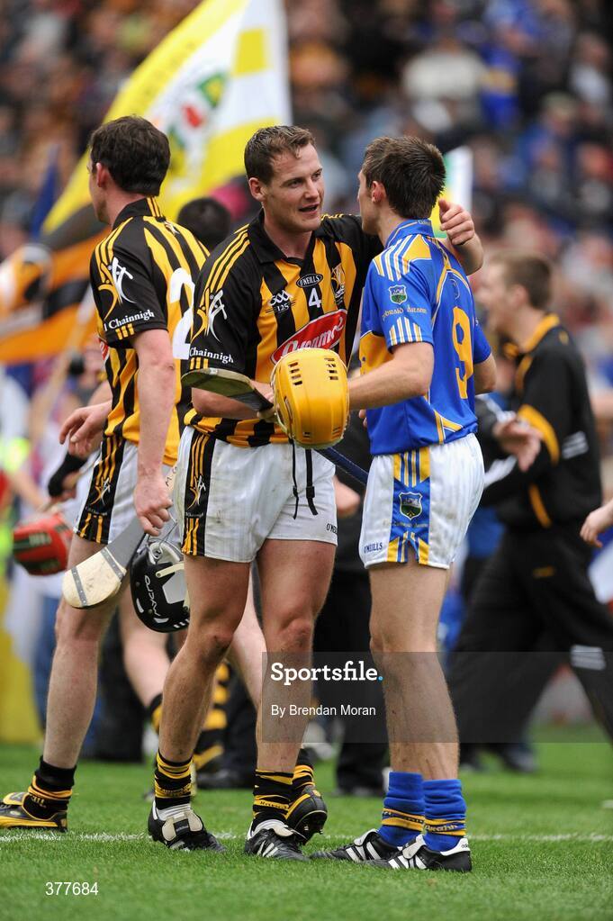 6 September 2009; Kilkenny's Jackie Tyrrell commiserates with Shane McGrath, Tipperary, after the final whistle. GAA Hurling All-Ireland Senior Championship Final, Kilkenny v Tipperary, Croke Park, Dublin. Picture credit: Brendan Moran / SPORTSFILE