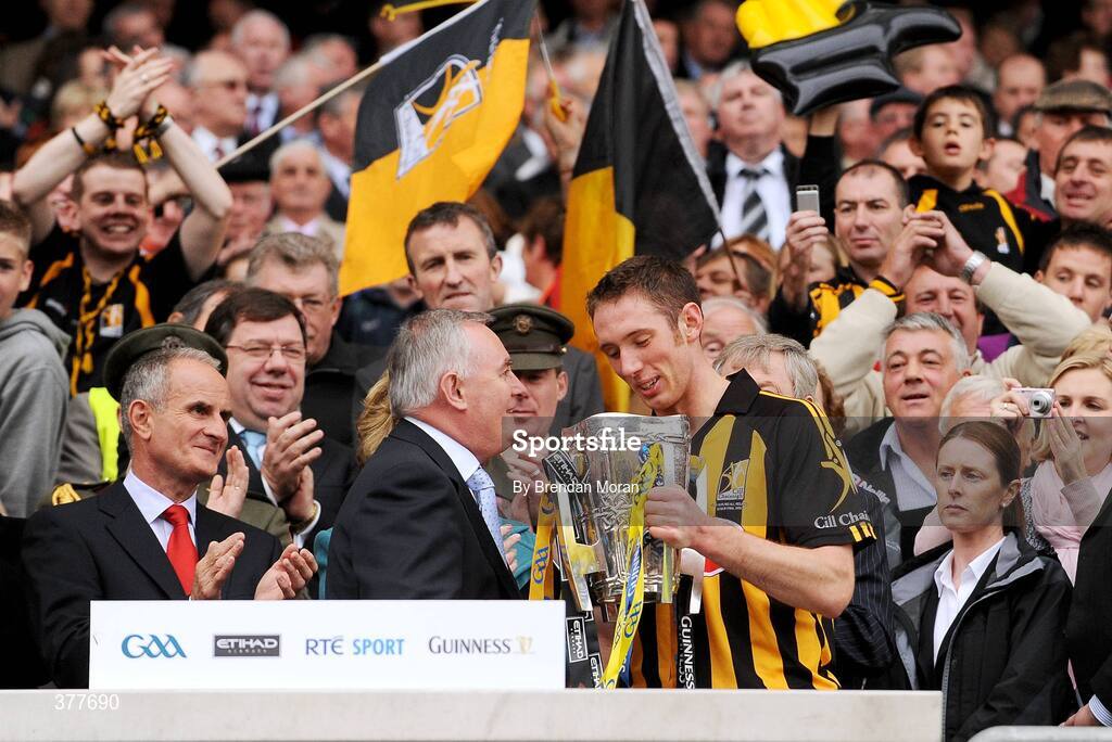 6 September 2009; Uachtarán Chumann Lúthchleas Gael Criostóir Ó Cuana presents the Kilkenny captain Michael Fennelly with the Liam MacCarthy Cup. GAA Hurling All-Ireland Senior Championship Final, Kilkenny v Tipperary, Croke Park, Dublin. Picture credit: Brendan Moran / SPORTSFILE
