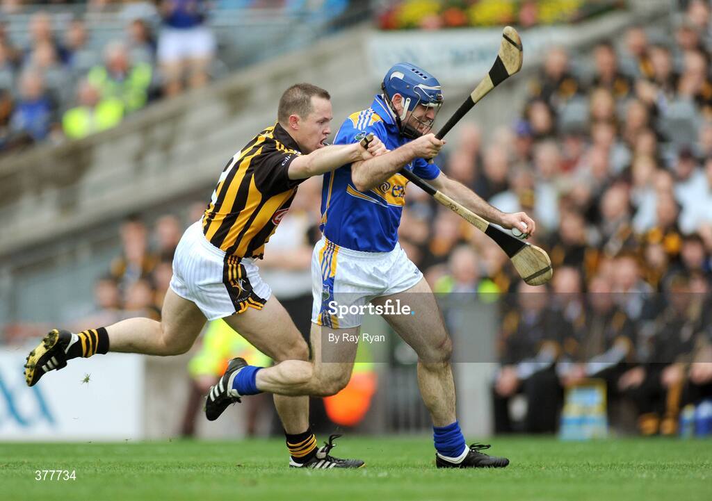 6 September 2009; Eoin Kelly, Tipperary, is tackled by Michael Kavanagh, Kilkenny. GAA Hurling All-Ireland Senior Championship Final, Kilkenny v Tipperary, Croke Park, Dublin. Picture credit: Ray Ryan / SPORTSFILE
