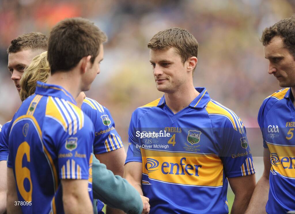 6 September 2009; President Mary McAleese shakes hands with Tipperary's Paul Curran before the game. GAA Hurling All-Ireland Senior Championship Final, Kilkenny v Tipperary, Croke Park, Dublin. Picture credit: Oliver McVeigh / SPORTSFILE