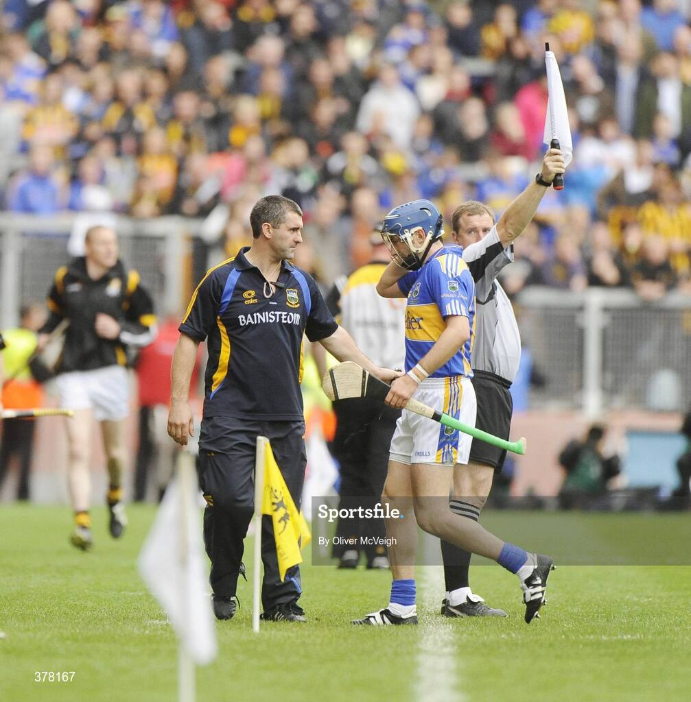 6 September 2009; Tipperary manager Liam Sheedy with Benny Dunne as he makes his way off the field after receiving a red card. GAA Hurling All-Ireland Senior Championship Final, Kilkenny v Tipperary, Croke Park, Dublin. Picture credit: Oliver McVeigh / SPORTSFILE