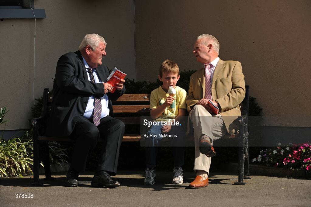 12 September 2009; Trainer M McDonagh in conversation with racegoers Peter Cotter and seven-year-old Enda Mallon, both from Limerick, before the days racing. The Curragh Racecourse, Co. Kildare. Picture credit: Ray McManus / SPORTSFILE