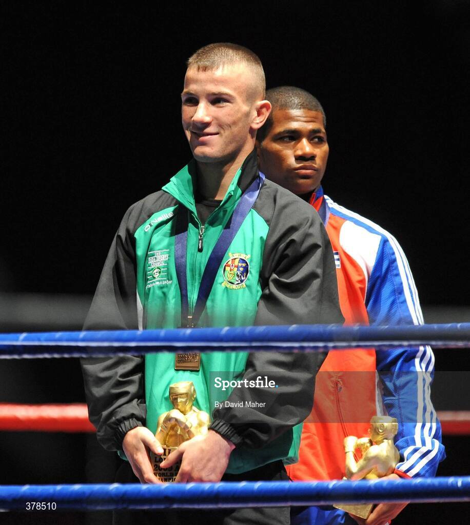 12 September 2009; John Joe Nevin, Ireland celebrates after being presented with a bronze medal following his defeat to Eduard Abzalimov, Russia, in their 54kg Bantamweight Semi-Final. AIBA World Boxing Championships, Final, Assago, Milan, Italy. Picture credit: David Maher / SPORTSFILE