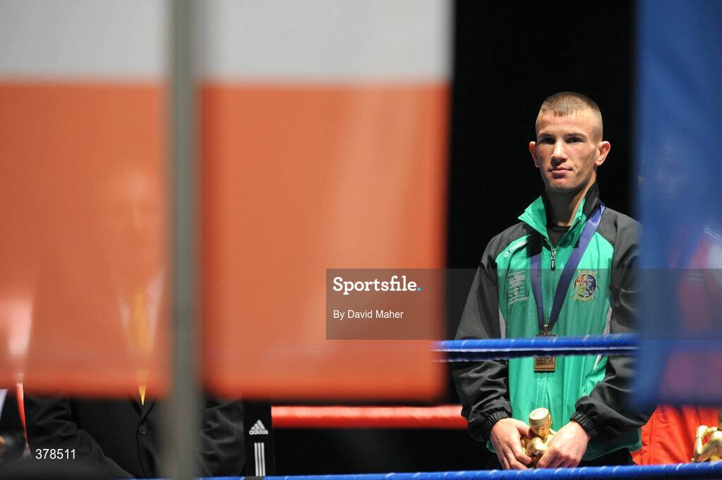 12 September 2009; John Joe Nevin, Ireland, celebrates after being presented with a bronze medal following his defeat to Eduard Abzalimov, Russia, in their 54kg Bantamweight Semi-Final. AIBA World Boxing Championships, Final, Assago, Milan, Italy. Picture credit: David Maher / SPORTSFILE