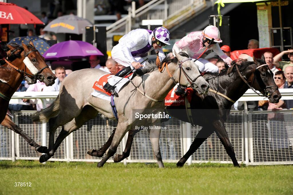 12 September 2009; Pat Smullen on Irish Heartbeat, on the rails, wins from Sioduill, with Kevin Manning up, on their way to winning The ladbrokes.com Autumn Festival Handicap. The Curragh Racecourse, Co. Kildare. Picture credit: Ray McManus / SPORTSFILE