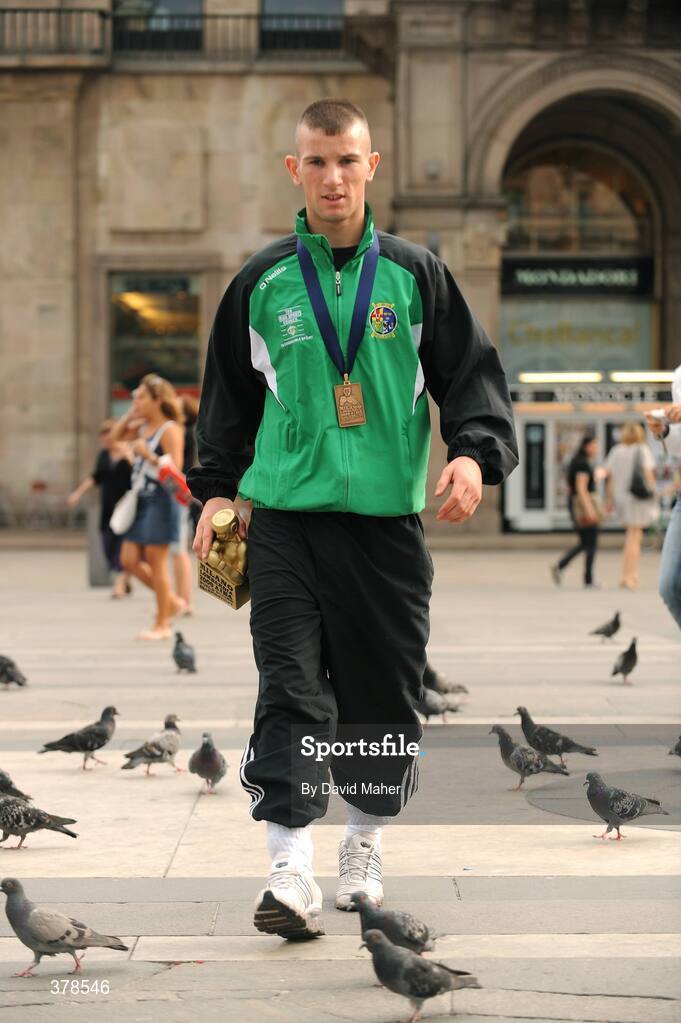 12 September 2009; John Joe Nevin, Ireland, celebrates with his bronze medal outside Milan Cathedral, following his defeat to Eduard Abzalimov, Russia, in their 54kg Bantamweight Semi-Final. AIBA World Boxing Championships, Final, Assago, Milan, Italy. Picture credit: David Maher / SPORTSFILE