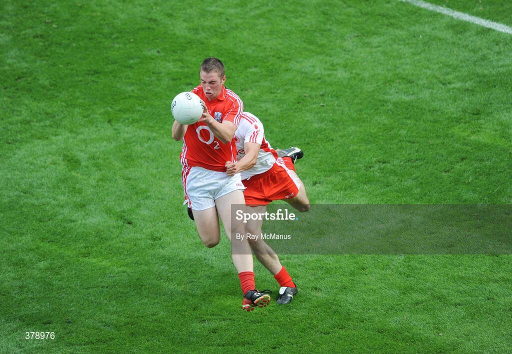 23 August 2009; Colm O'Neill, Cork, in action against P.J. Quinn, Tyrone. GAA Football All-Ireland Senior Championship Semi-Final, Tyrone v Cork, Croke Park, Dublin. Picture credit: Ray McManus / SPORTSFILE