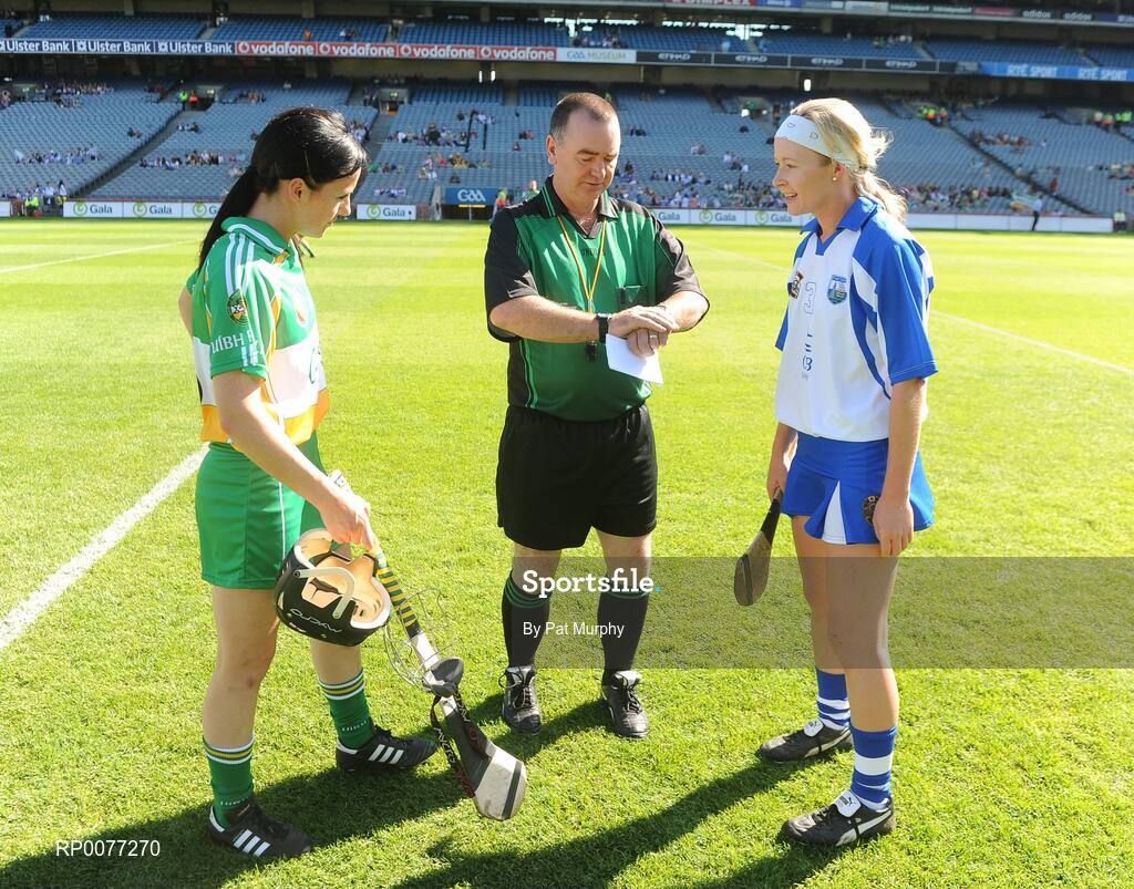 13 September 2009; Referee Pat Walsh tosses the coin between Offaly captain Marion Crean, left, and Waterford captain Sally O'Grady before the Gala All-Ireland Junior Camogie Championship Final. Offaly v Waterford. Croke Park, Dublin. Picture credit: Pat Murphy / SPORTSFILE