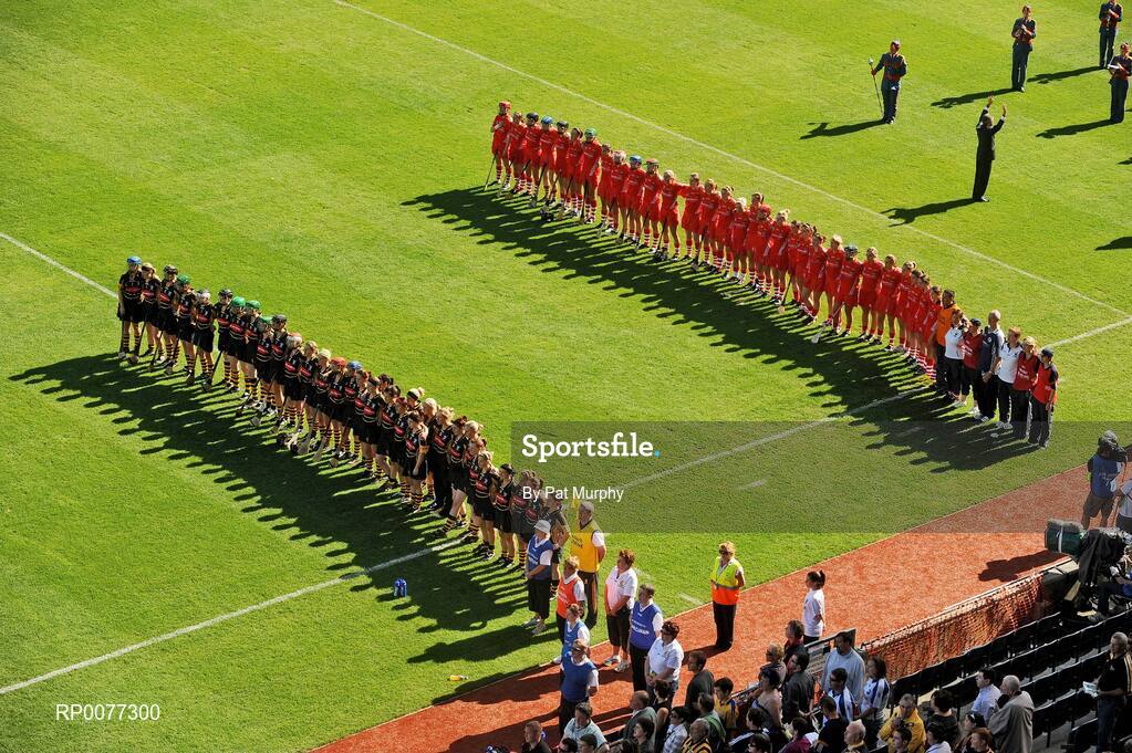 13 September 2009; The Cork and Kilkenny teams stand for the national anthem before the Gala All-Ireland Senior Camogie Championship Final, Cork v Kilkenny. Croke Park, Dublin. Picture credit: Pat Murphy / SPORTSFILE