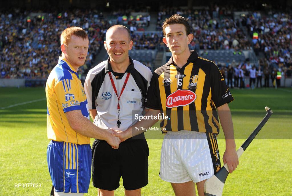 13 September 2009; Clare captain Ciaran O'Doherty and Kilkenny captain David Langton shake hands in front of referee Cathal McAllister. Bord Gais Energy GAA All-Ireland U21 Hurling Championship Final, Clare v Kilkenny, Croke Park, Dublin. Picture credit: Ray McManus / SPORTSFILE