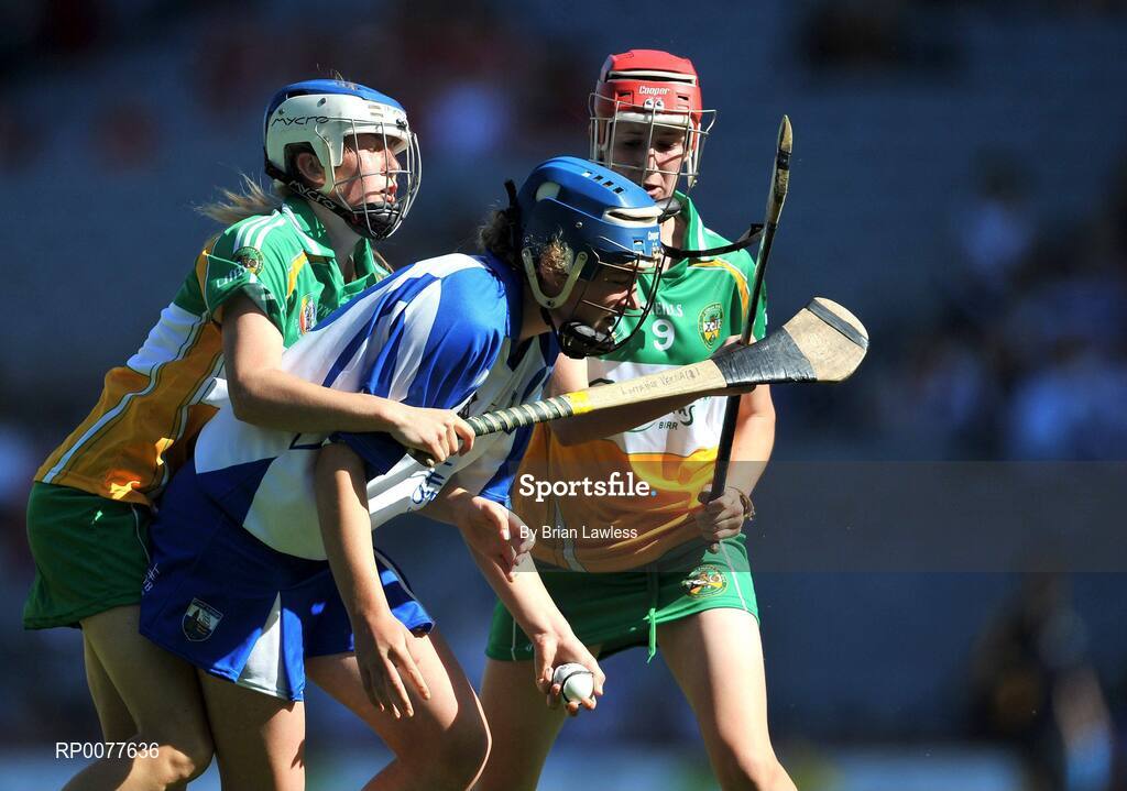 13 September 2009; Patricia Jackman, Waterford, in action against Lorraine Kenna, left, and Michaela Morkan, Offaly. Gala All-Ireland Junior Camogie Championship Final, Offaly v Waterford, Croke Park, Dublin. Picture credit: Brian Lawless / SPORTSFILE