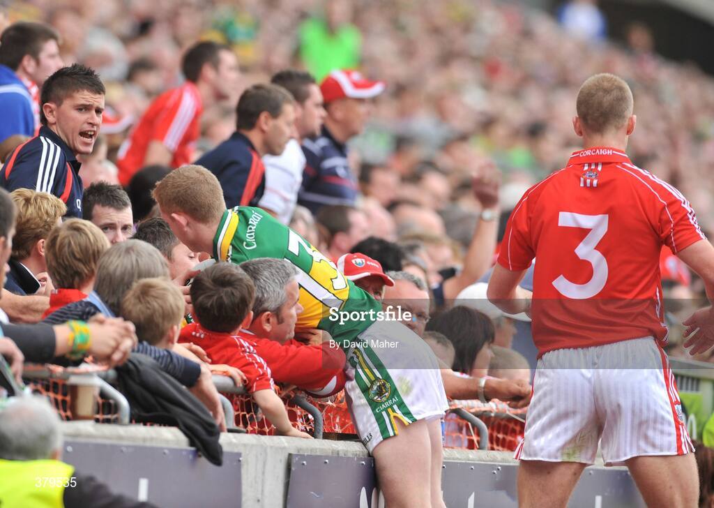 20 September 2009; Colm Cooper, Kerry, collides with spectators in the Hogan stand, after a tackle with Michael Shields, Cork. GAA Football All-Ireland Senior Championship Final, Kerry v Cork, Croke Park, Dublin. Picture credit: David Maher / SPORTSFILE