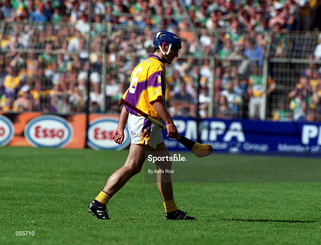 18 June 2000; Liam Dunne of Wexford leaves the field after being sent off by referee Willie Barrett during the Guinness Leinster Senior Hurling Championship Semi-Final match between Offaly and Wexford at Croke Park in Dublin. Photo by Aoife Rice/Sportsfile