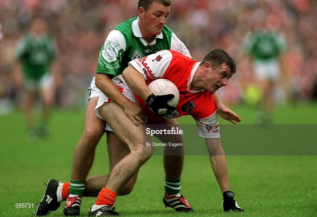 25 June 2000; Justin McNulty of Armagh in action against Shane King of Fermanagh during the Bank of Ireland Ulster Senior Football Championship Semi-Final match between Armagh and Fermanagh at St Tiernach's Park in Clones, Monaghan. Photo by Damien Eagers/Sportsfile
