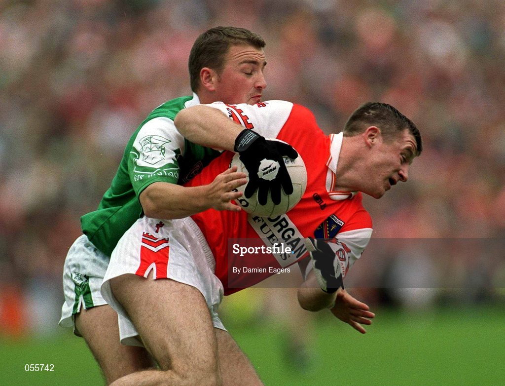 25 June 2000; Justin McNulty of Armagh in action against Shane King of Fermanagh during the Bank of Ireland Ulster Senior Football Championship Semi-Final match between Armagh and Fermanagh at St Tiernach's Park in Clones, Monaghan. Photo by Damien Eagers/Sportsfile