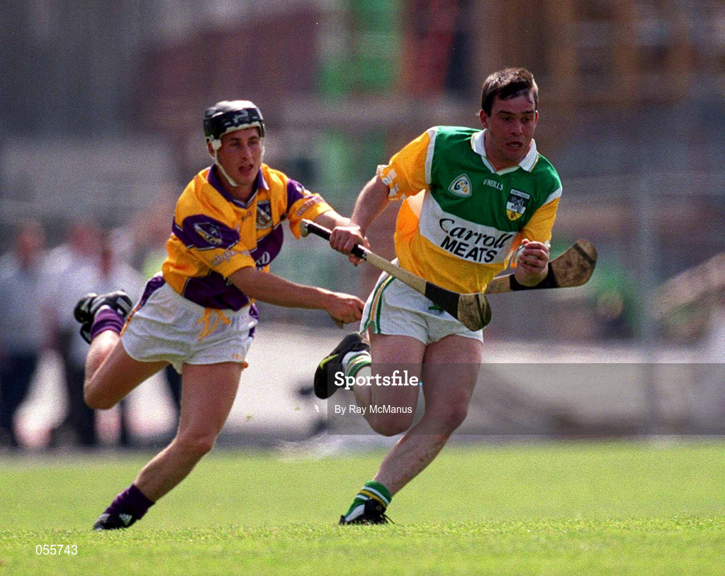 18 June 2000; Johnny Pilkington of Offaly in action against Rory McCarthy of Wexford during the Guinness Leinster Senior Hurling Championship Semi-Final match between Offaly and Wexford at Croke Park in Dublin. Photo by Ray McManus/Sportsfile