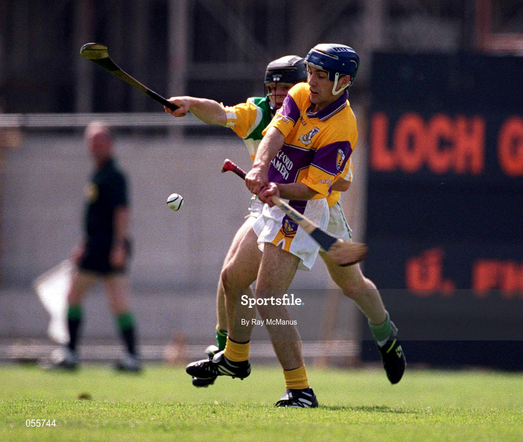 18 June 2000; Liam Dunne of Wexford in action against Brendan Murphy of Offaly during the Guinness Leinster Senior Hurling Championship Semi-Final match between Offaly and Wexford at Croke Park in Dublin. Photo by Ray McManus/Sportsfile
