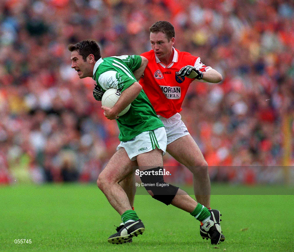 25 June 2000; Rory Gallagher of Fermanagh in action against Andrew McCann of Armagh during the Bank of Ireland Ulster Senior Football Championship Semi-Final match between Armagh and Fermanagh at St Tiernach's Park in Clones, Monaghan. Photo by Damien Eagers/Sportsfile